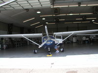 N182XT @ KLVN - Parked inside the maintenance hangar. - by Mitch Sando