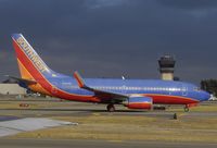 N797MX @ KBFI - Southwest B737 taxiing on a cloudy day. - by Mike Khansa