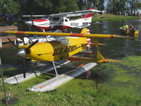N2505P @ 96WI - 2006 Knapp MICRO MONG SPORT, Rotax 582 65 Hp. C gearbox 3:1 ratio-5,000 rpm gives 90 mph, RK 400 clutch. Scratchbuilt floats. This little, light seaplane lifts off in an incredible two and one-half seconds! Cockpit access not too easy! - by Doug Robertson