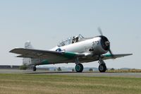 N7090C @ KFCM - Taxiing for takeoff at AirExpo 2008, Flying Cloud Airport, Eden Prairie, MN - by Peter J. Markham