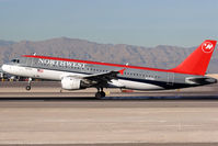 N375NC @ LAS - Northwest Airlines N375NC (FLT NWA777) from Minneapolis/St Paul (KMSP) landing on RWY 25L. - by Dean Heald