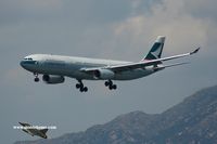 B-HLC @ VHHH - Cathay Pacific arriving on runway 25R - by Michel Teiten ( www.mablehome.com )