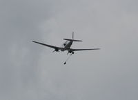 N47HL @ YIP - Commemorative Air Force's C-47 Blue Bonnet Belle dropping parachutes
