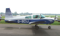 G-BCIJ @ EGSX - Grumman AA-5 at North Weald - by Terry Fletcher