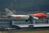 OO-THB @ VHHH - Colorful TNT approaching runway 25L - by Michel Teiten ( www.mablehome.com )