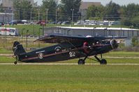 N11153 @ IOW - Exiting Runway 30 with the U.S. Mail