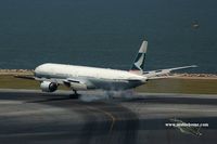 B-HNP @ VHHH - Cathay Pacific touching down on runway 25R - by Michel Teiten ( www.mablehome.com )