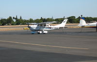 N7359C @ SAC - Hiding undercover from Turlock, CA is this 1977 Cessna TU206G (with apologies to Bob Weir and Kingfish) @ Sacramento Exec, CA - by Steve Nation