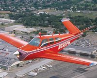 N590PM @ BEC - over Beechcraft Factory 2002 - by Mike Fizer