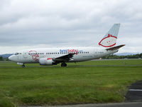 G-BVZE @ EGPF - BMI Baby B737 taxiing to runway 05 At Glasgow airport - by Mike stanners