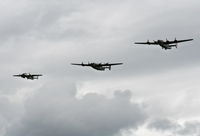 N224J @ YIP - Two B-24s and a B-25 - by Florida Metal