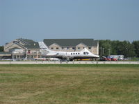 N712KM @ OSH - 1977 Cessna CITATION 500, two P&W JT15D-1A turbofans 2,200 lb st for takeoff each, takeoff roll Rwy 09 - by Doug Robertson