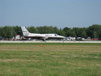 N125EA @ OSH - 1979 Cessna CITATION I/SP 501, two P&W(C)JT15D-1 turbofans 2,200 Lb st each. Experimental class, takeoff roll Rwy 09 - by Doug Robertson