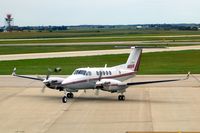 N68FB @ CID - Taxiing to Landmark FBO, as seen from my office window. - by Glenn E. Chatfield