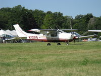 N731FG @ OSH - 1979 Cessna P210N CENTURION, Continental TSIO-520-CE 325 Hp, pressurized & turbocharged, taxi - by Doug Robertson