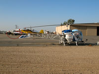 N28938 @ MIT - Inland Crop Dusters 1970 Bell 47G-4A as sprayer and in non-standard colors @ Shafter, CA - by Steve Nation
