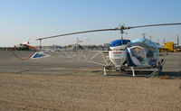 N28938 @ MIT - Inland Crop Dusters 1970 Bell 47G-4A as sprayer and in non-standard colors @ Shafter, CA - by Steve Nation