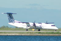 C-GLQE @ CYTZ - Porter Airlines - Taxiing - by David Burrell
