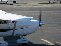 N7276Q @ PAO - Close-up of engine running up on 1999 Cessna 182S holding by tower @ Palo Alto, CA - by Steve Nation