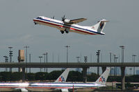 N498AT @ DFW - American Eagle departing runway 36R at DFW