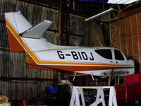 G-BIOJ @ EGSP - inside the main hangar at Sibson - by chris hall