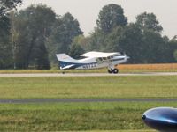 N97ZZ @ DLZ - Landing RWY 28 at Delaware, Ohio - by Bob Simmermon