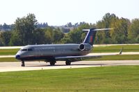 N965SW @ CID - Turning on to Bravo after back-taxiing on Runway 31 after landing - by Glenn E. Chatfield