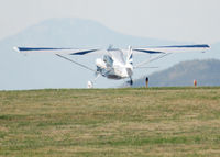 N757J @ KAPA - Landing on 17L with Pikes Peak in the Distance. - by Bluedharma