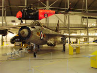 XM135 @ EGSU - displayed inside the AirSpace hangar, Duxford - by chris hall