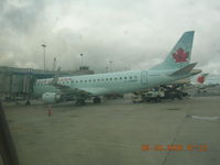 C-FHNW @ CYHZ - On gate at Halifax - by John J. Boling