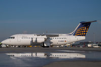 D-AEWF @ VIE - Lufthansa Regional Avro 100 - reflection - by Yakfreak - VAP