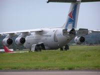 EI-CPL @ EGTE - BAe 146 parked at Exeter - by Simon Palmer
