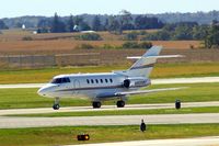 N800RC @ CID - Taxiing on Alpha to Rockwell-Collins - by Glenn E. Chatfield