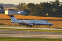 N433FX @ CID - FlexJet on takeoff roll Runway 27, not long after sunrise. - by Glenn E. Chatfield