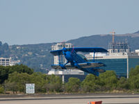 N540BE @ SMO - N540BE departing from RWY 21 and starting a steep climb. - by Torsten Hoff