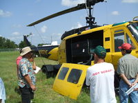 N902HE @ X14 - Helicopter being sold at auction by closed LaBelle, Florida crop dusting company - location near the LaBelle airport on company grounds - by Don Browne