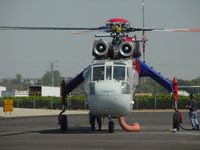 N44094 @ POC - Preflight check at Brackett - by Helicopterfriend
