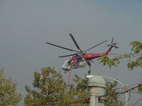 N44094 @ POC - Leaving with tank full of water La Verne, Ca - by Helicopterfriend