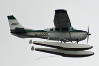 N5303X - Andrew Airways Cessna 206 serial U20605622 on straight floats flying by Fort Miller, Kodiak, AK - by Timothy Aanerud