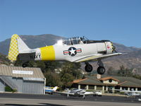 N817TX @ SZP - 1942 North Americsan AT-6D 'Problem Child', P&W R-1340 600 Hp, takeoff climb Rwy 04 - by Doug Robertson