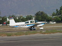 N215ER @ POC - Taxiing for take off at south Brackett taxiway - by Helicopterfriend