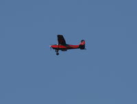 N503ST - Cessna 180B in holding pattern over Lake Parker on way to Sun N Fun