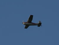 N7583K - Cessna 180J in holding pattern over Lake Parker on way to Sun N Fun - by Florida Metal