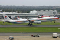 B-6052 @ YSSY - About to touchdown after the trip from Shanghai - by Bill Mallinson