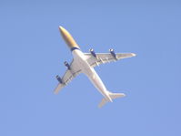 A9C-LH @ OMDB - Bahrain reg A340 departing Dubai OMDB/DXB. Shot from hotel pool. - by John J. Boling