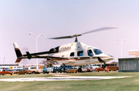 N22299 - Bell 222 at the Grand Prairie, Texas plant helipad - by Zane Adams