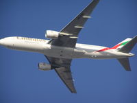 A6-EMD @ OMDB - Emirates B-777 departing Duabi - by John J. Boling