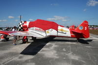 N991GM @ SUA - Aeroshell T-6 - by Florida Metal
