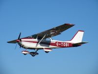 G-TOBI @ EGSF - Cessna landing at Conington - by Simon Palmer