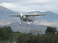 N273MD @ SZP - Dickenson Howard DGA-21 'Flying D', P&W R-1340-57 600 Hp Wasp radial, landing Rwy 22-faster than a speeding bullet-or my camera - by Doug Robertson
